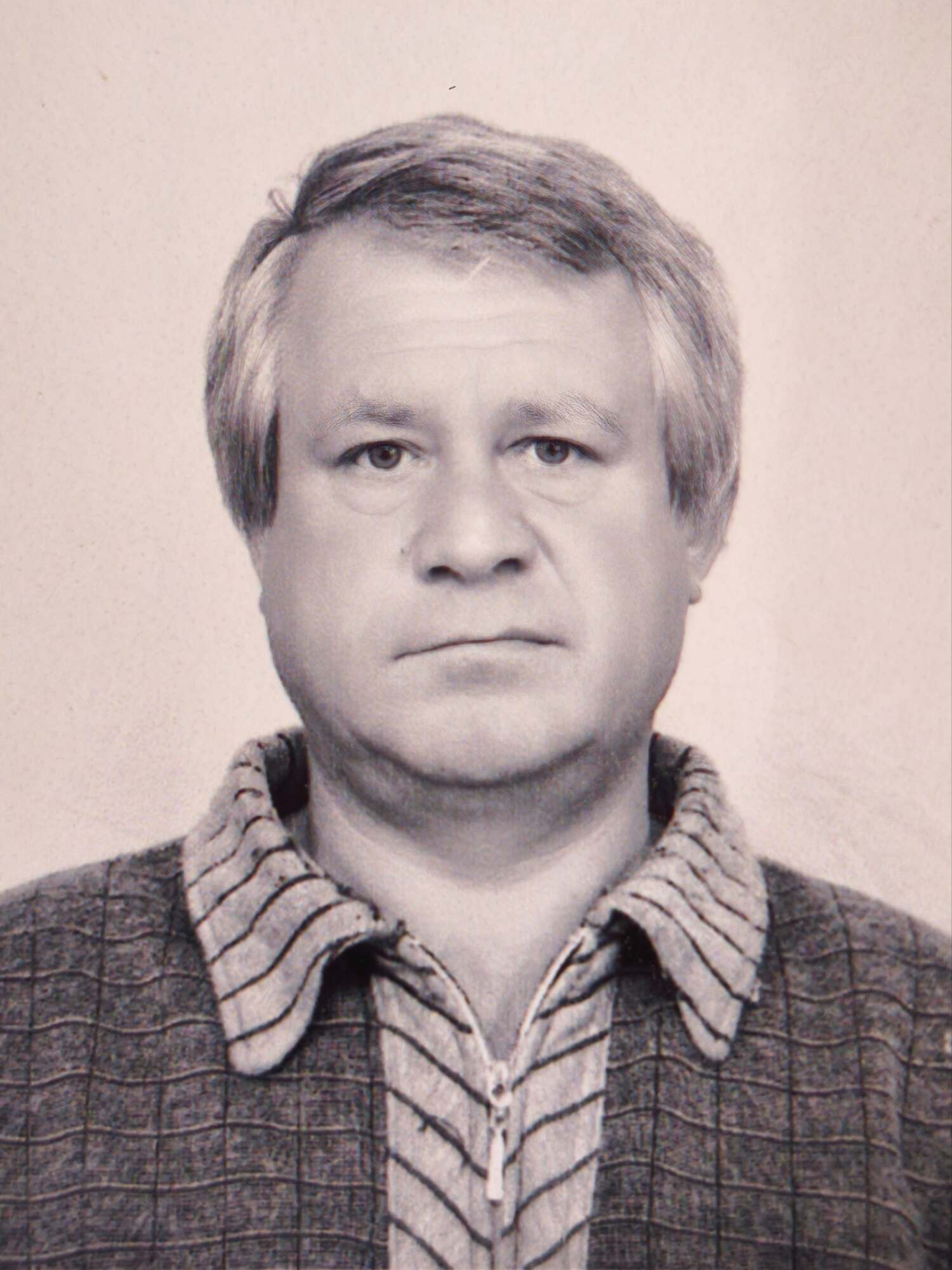 Old damaged photo before restoration for laser engraving — scratches and fading visible